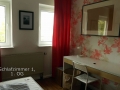 Schlafzimmer 1 im OG mit Schreibtisch - Ferienhaus Steffen in Teterow.jpg